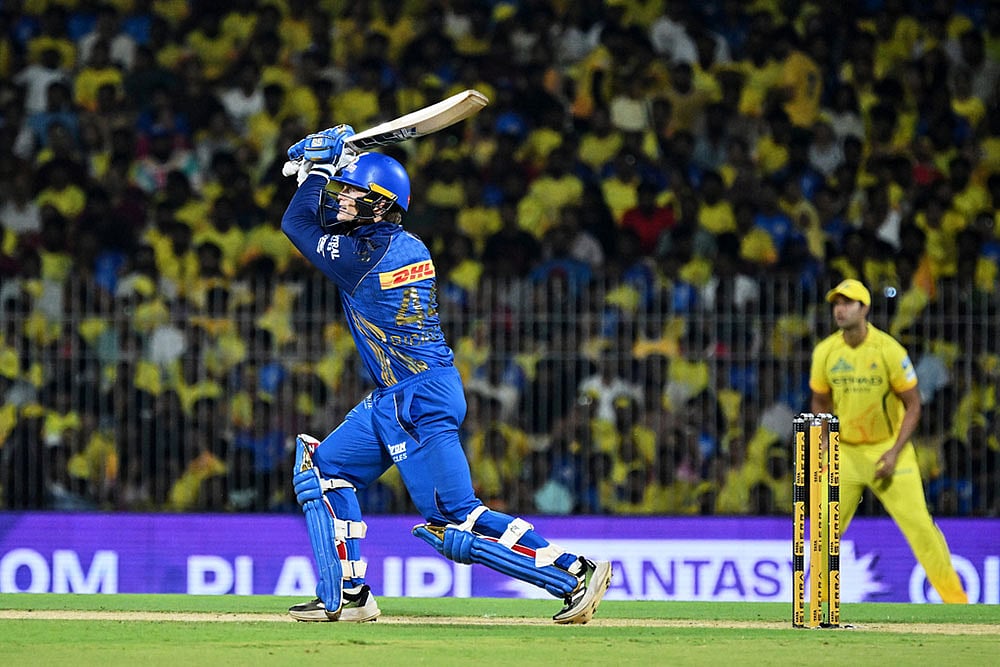 | Photo: AP  : Mumbai Indians Ryan Rickelton plays a shot during the Indian Premier League cricket match between Chennai Super Kings and Mumbai Indians in Chennai, India.