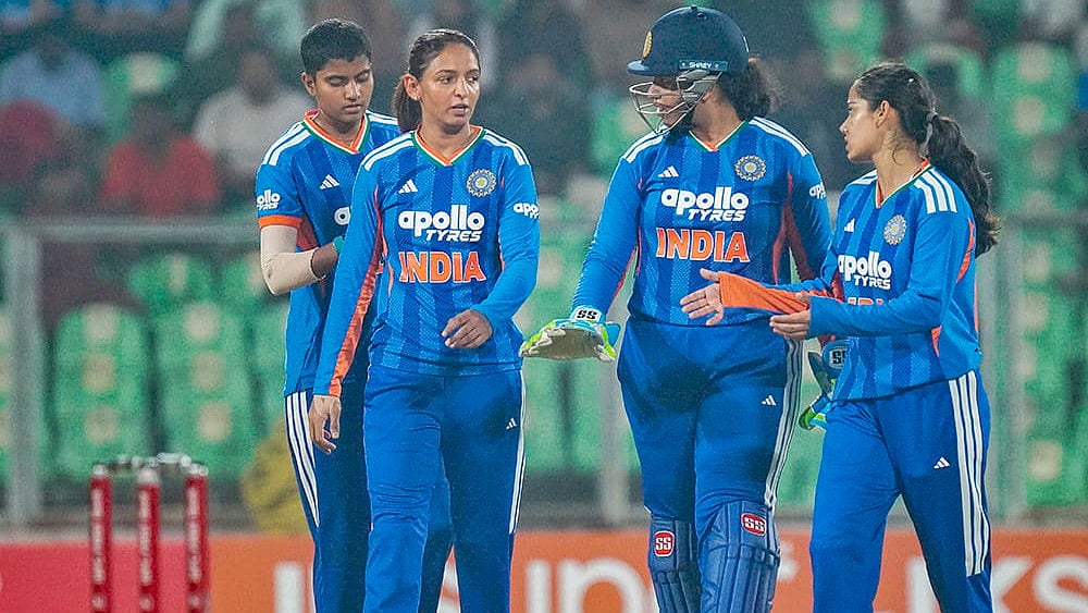 | Photo: PTI : Indias captain Harmanpreet Kaur with teammates during the fifth T20 International cricket match of a series between India Women and Sri Lanka Women, at Greenfield International Stadium, in Thiruvananthapuram.