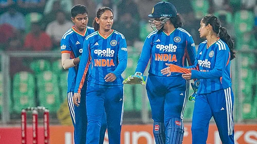 | Photo: PTI : Indias captain Harmanpreet Kaur with teammates during the fifth T20 International cricket match of a series between India Women and Sri Lanka Women, at Greenfield International Stadium, in Thiruvananthapuram.