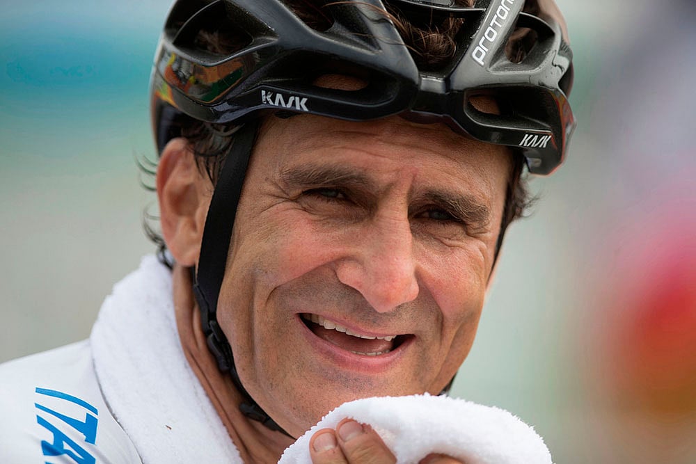 | Photo: AP/Mauro Pimentel, File : Alex Zanardi, smiles after winning the silver medal in the mens road race H5, during the 2016 Paralympics Games, in Rio de Janeiro, Brazil.
