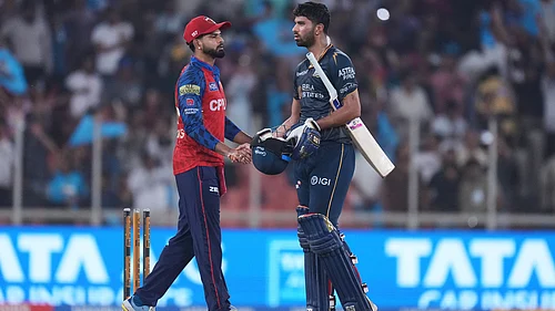 (AP Photo/Ajit Solanki) : Gujarat Titans Washington Sundar shakes hands with Punjab Kings captain Shreyas Iyer following their win during the Indian Premier League cricket match between Gujarat Titans and Punjab Kings in Ahmedabad, India, Sunday, May 3, 2026