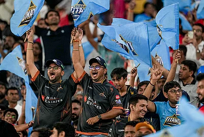 | Photo: PTI/Arun Sharma : Gujarat Titans fans cheer ahead of the Indian Premier League (IPL) 2026 T20 cricket match between Gujarat Titans and Punjab Kings, in Ahmedabad.