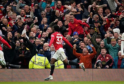 | Photo: AP/Dave Thompson : Manchester Uniteds Kobbie Mainoo celebrates after scoring his sides third goal during the English Premier League soccer match between Manchester United and Liverpool in Manchester, England.