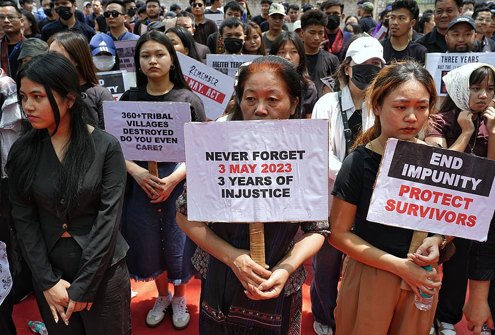 | Photo: Suresh K. Pandey/Outlook : People hold placards during a protest on the third anniversary of the Manipur violence, at Jantar Mantar, in New Delhi.