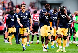 | Photo: Nick Potts/PA via AP : West Ham United's Konstantinos Mavropanos, left, looks dejected with teammates following the English Premier League soccer match between Brentford and West Ham United in London.