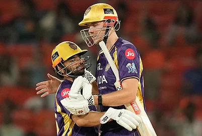 | Photo: AP/Mahesh Kumar A. : Kolkata Knight Riders Rinku Singh, left and Cameron Green celebrate their win over Sunrisers Hyderabad during the Indian Premier League cricket match in Hyderabad.