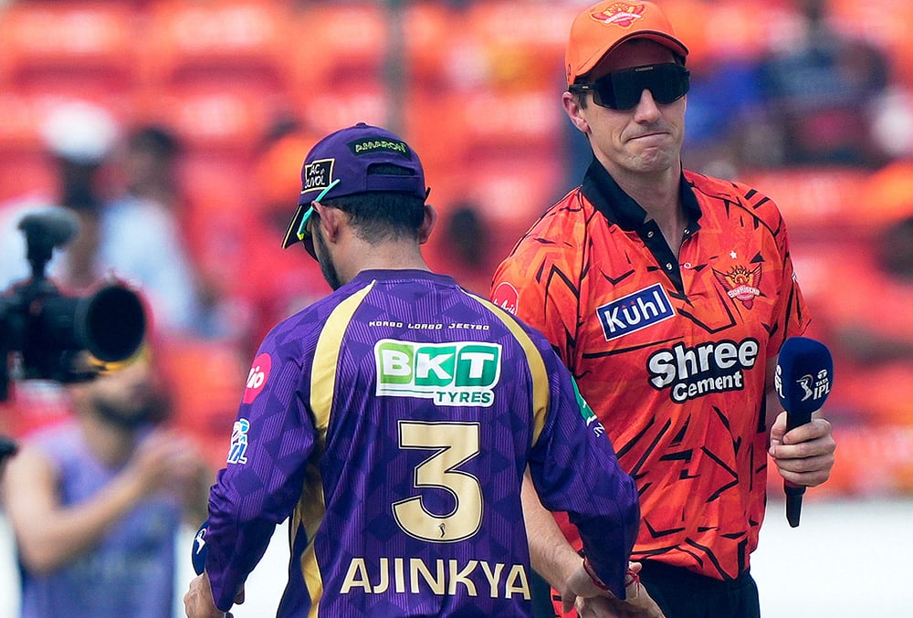 | Photo: AP/Mahesh Kumar A. : Sunrisers Hyderabads Pat Cummins, right and Kolkata Knight Riders captain Ajinkya Rahane shake hands after the coin toss during the Indian Premier League cricket match between Sunrisers Hyderabad.