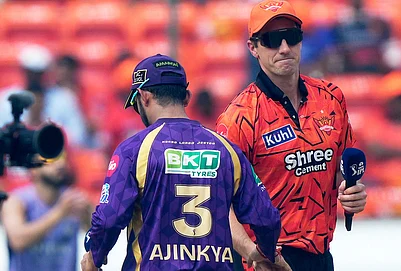 | Photo: AP/Mahesh Kumar A. : Sunrisers Hyderabads Pat Cummins, right and Kolkata Knight Riders captain Ajinkya Rahane shake hands after the coin toss during the Indian Premier League cricket match between Sunrisers Hyderabad.