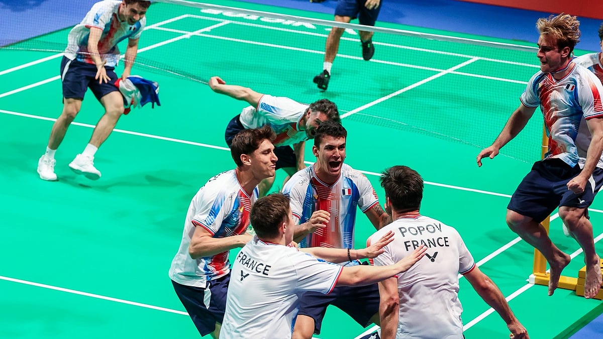 Photo: BWF via Badminton Photo : France celebrate after defeating India in the Thomas Cup semi-finals.