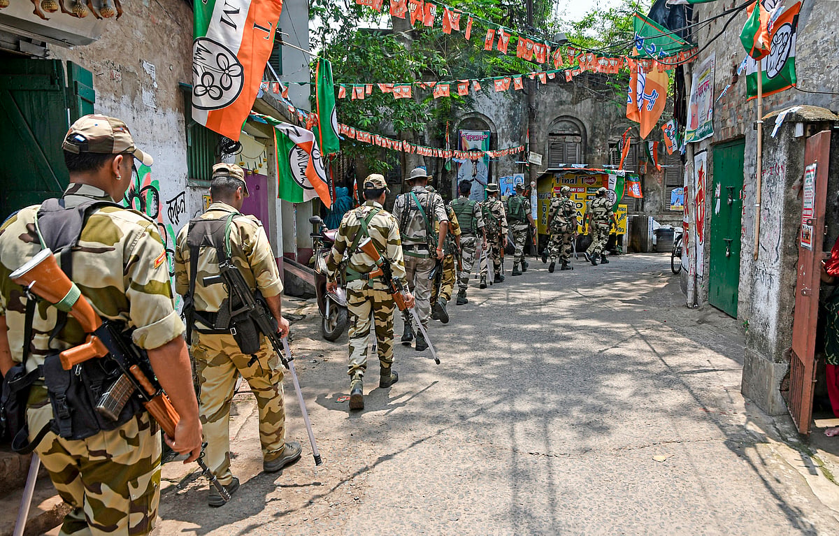 - pti : Security personnel patrol on the eve of counting and results of the West Bengal Assembly polls 