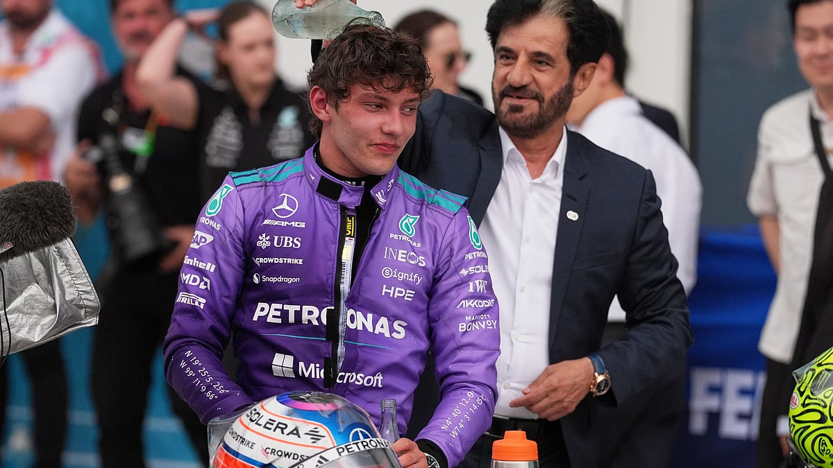 AP Photo : Mohammed Ben Sulayem President of the Federation Internationale de lAutomobile (FIA) pours water on the head of Mercedes driver Kimi Antonelli of Italy after Antonelli won the Miami Formula One Grand Prix auto race.