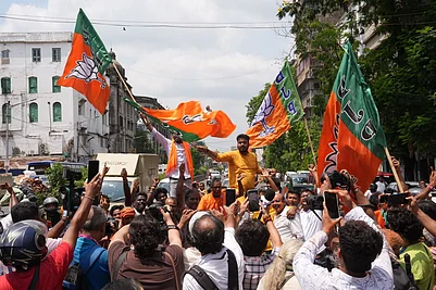 | Photo: Sandipan Chatterjee/Outlook : BJP workers celebrate as trends show the party leading in the West Bengal Assembly elections, in Kolkata.