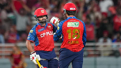 | Photo: PTI/Shiva Sharma : Punjab Kings Priyansh Arya, right, and Prabhsimran Singh interact between the wickets during the Indian Premier League (IPL) 2026 T20 cricket match between Punjab Kings and Rajasthan Royals, in Mullanpur.