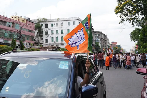 | Photo: Sandipan chatterjee/Outlook : BJP workers celebrate as trends show the party leading in the West Bengal Assembly elections, in Kolkata.