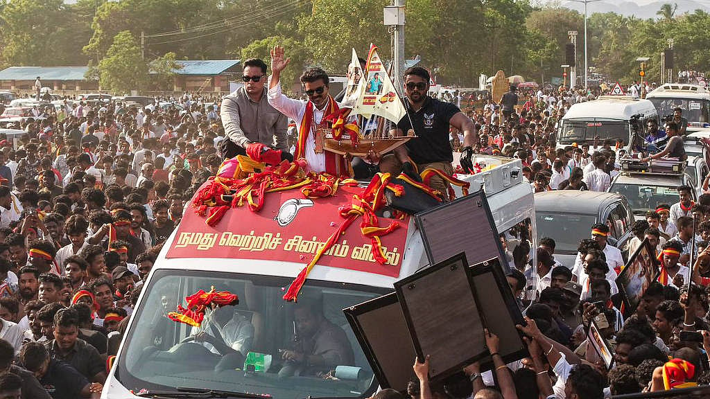  All eyes on Vijay the renowned film actor - The renowned actor-turned-politician Vijay amidst a sea of supporters and enthusiastic public crowd, during his election campaign at Kanya Kumari. 