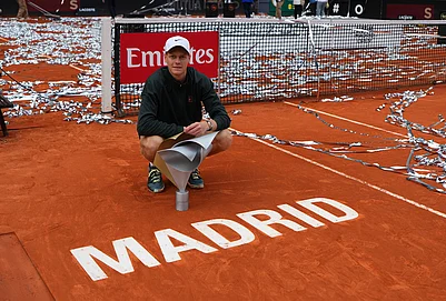 | Photo: AP/Manu Fernandez : Jannik Sinner, of Italy, poses for photographers after winning the mens singles tennis final match against Alexander Zverev, of Germany, at the Madrid Open tennis tournament in Madrid, Spain.