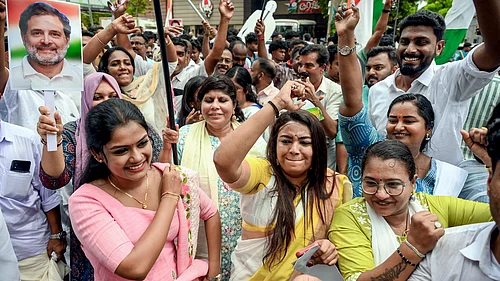 Photo: PTI/S.Gopakumar : Congress workers celebrate during vote tabulation on the day of Kerala Assembly election results, in Thiruvananthapuram, Monday, May 4, 2026.