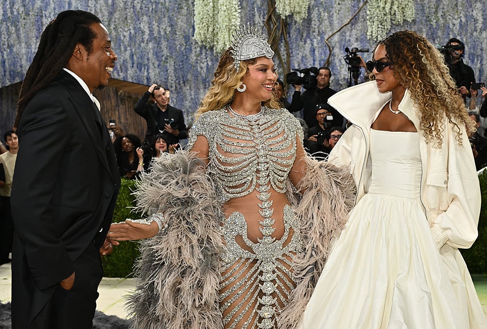 | Photo: Evan Agostini/Invision/AP : Jay-Z, from left, Beyoncé, and, Blue Ivy Carter arrive at The Metropolitan Museum of Arts Costume Institute benefit gala celebrating the opening of the Costume Art exhibition in New York. 