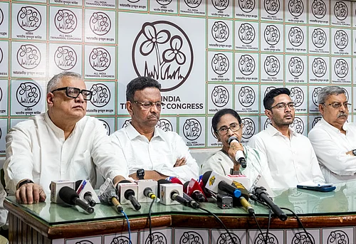 PTI : TMC supremo Mamata Banerjee addresses a press conference following the West Bengal Assembly elections result, at her residence, in Kolkata.