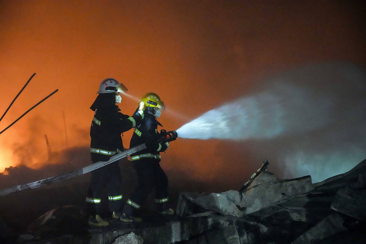 Rescuers work on site after an explosion at a fireworks plant in Guandu Town of Liuyang, central China s Hunan Province, in the early hours of May 5, 2026. 