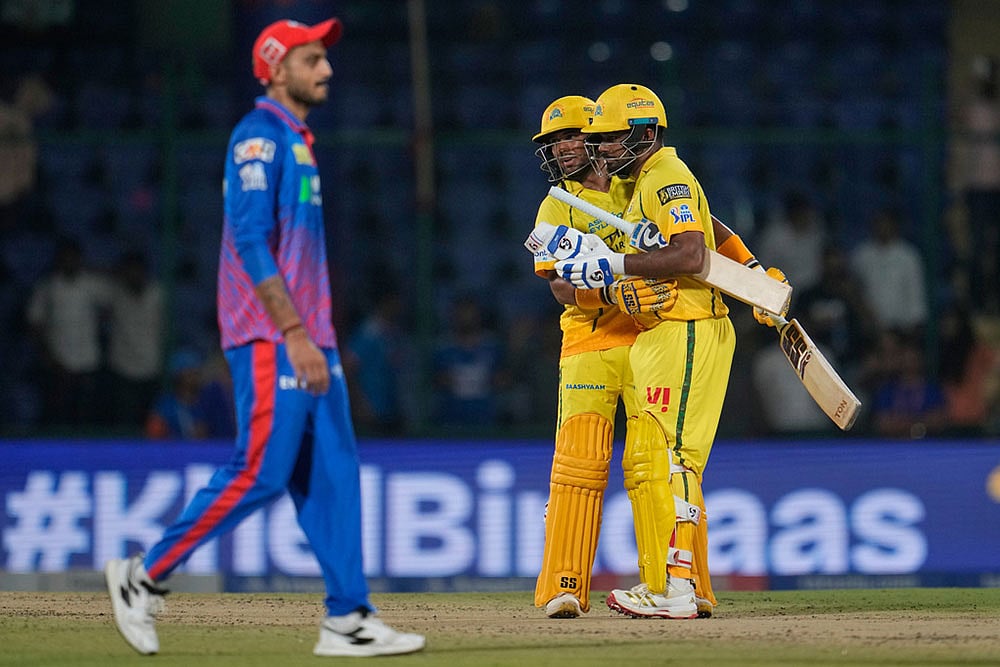 | Photo: AP/Manish Swarup : Chennai Super Kings Kartik Sharma and Sanju Samson celebrate their win in the Indian Premier League cricket match between Chennai Super Kings and Delhi Capitals in New Delhi, India.