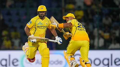 (AP Photo/Manish Swarup) : Chennai Super Kings Sanju Samson and Kartik Sharma run between the wickets to score during the Indian Premier League cricket match between Chennai Super Kings and Delhi Capitals in New Delhi, India, Tuesday, May 5, 2026.