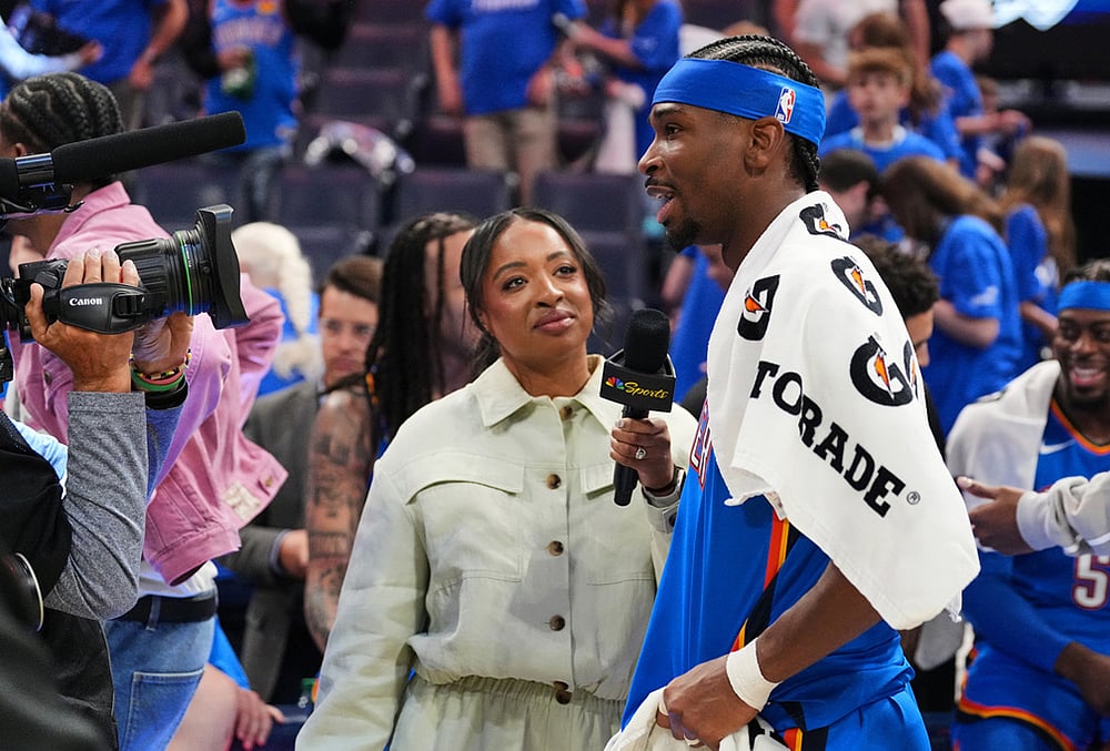 | Photo: AP/Kyle Phillips : Oklahoma City Thunder guard Shai Gilgeous-Alexander, right, gives a broadcast interview after the teams Game 1 in a second-round NBA basketball playoffs series against the Los Angeles Lakers in Oklahoma City. 
