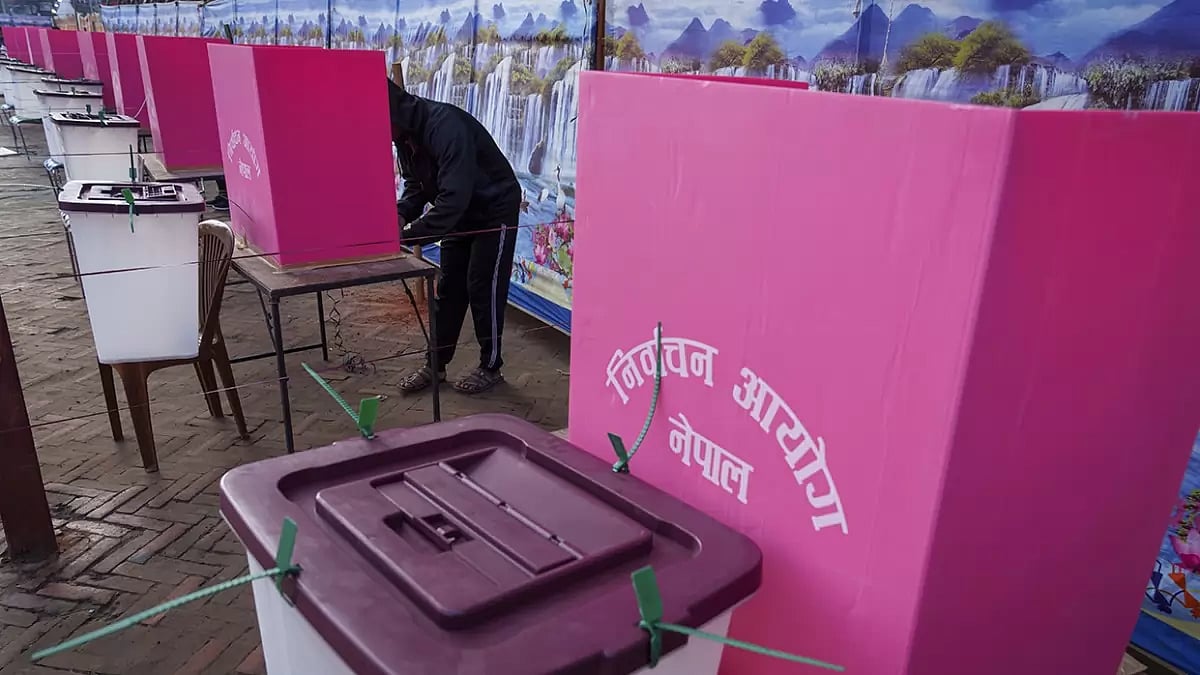 File photo; Representative image : A man casts his vote during the general election in Kathmandu, Nepal.