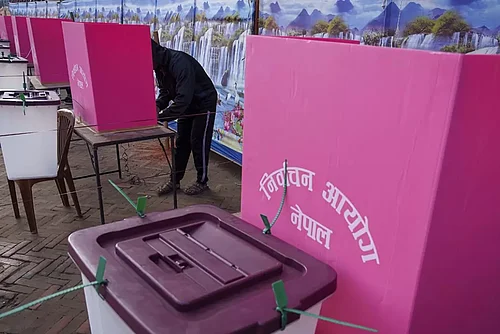 File photo; Representative image : A man casts his vote during the general election in Kathmandu, Nepal.